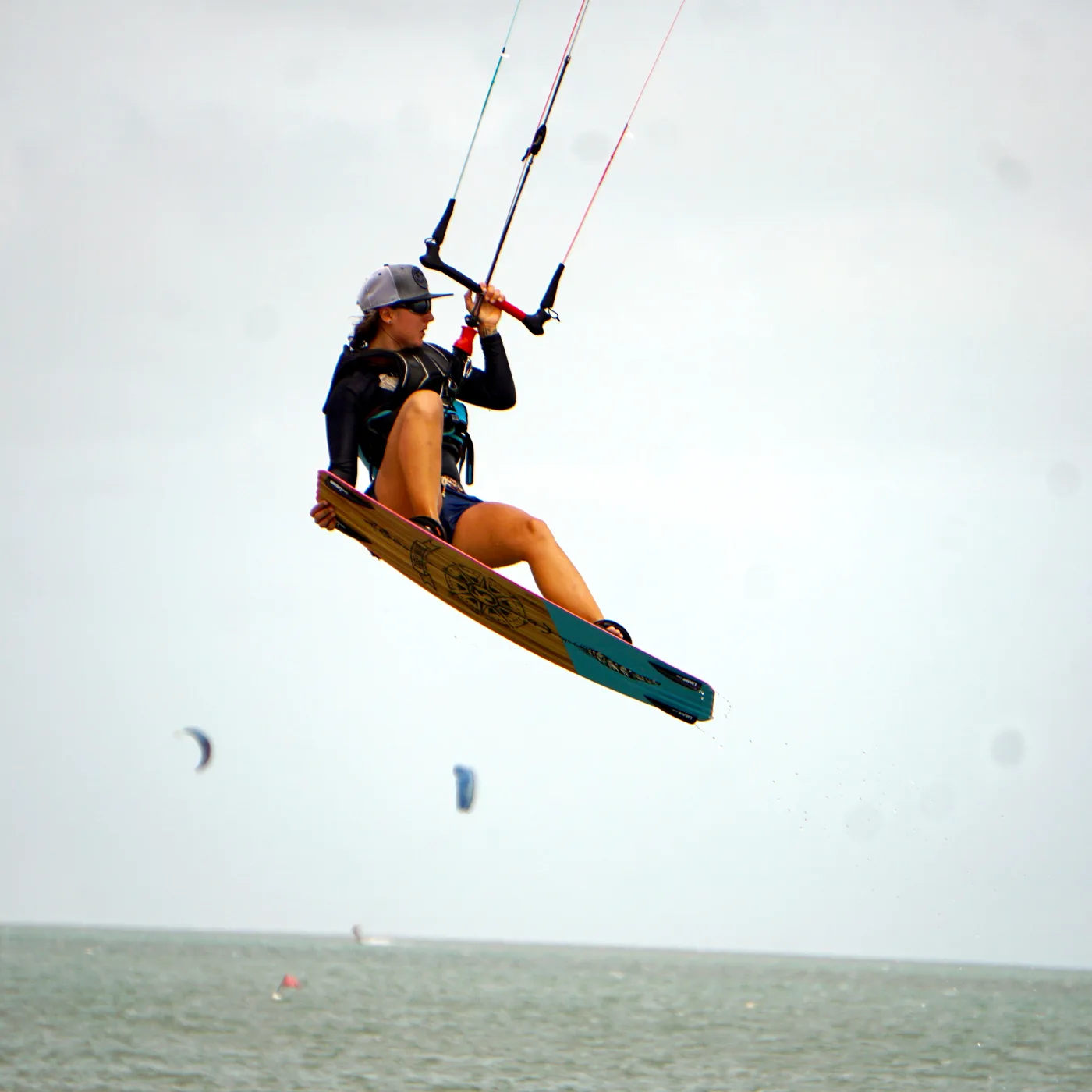 Kitesurfer boosting a jump on Kalpitiya Lagoon after a 5-day course