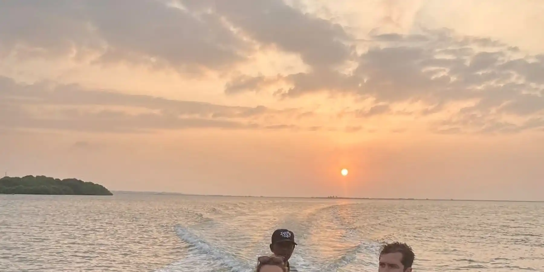 Calm winter-season boat ride at sunset on Kalpitiya Lagoon